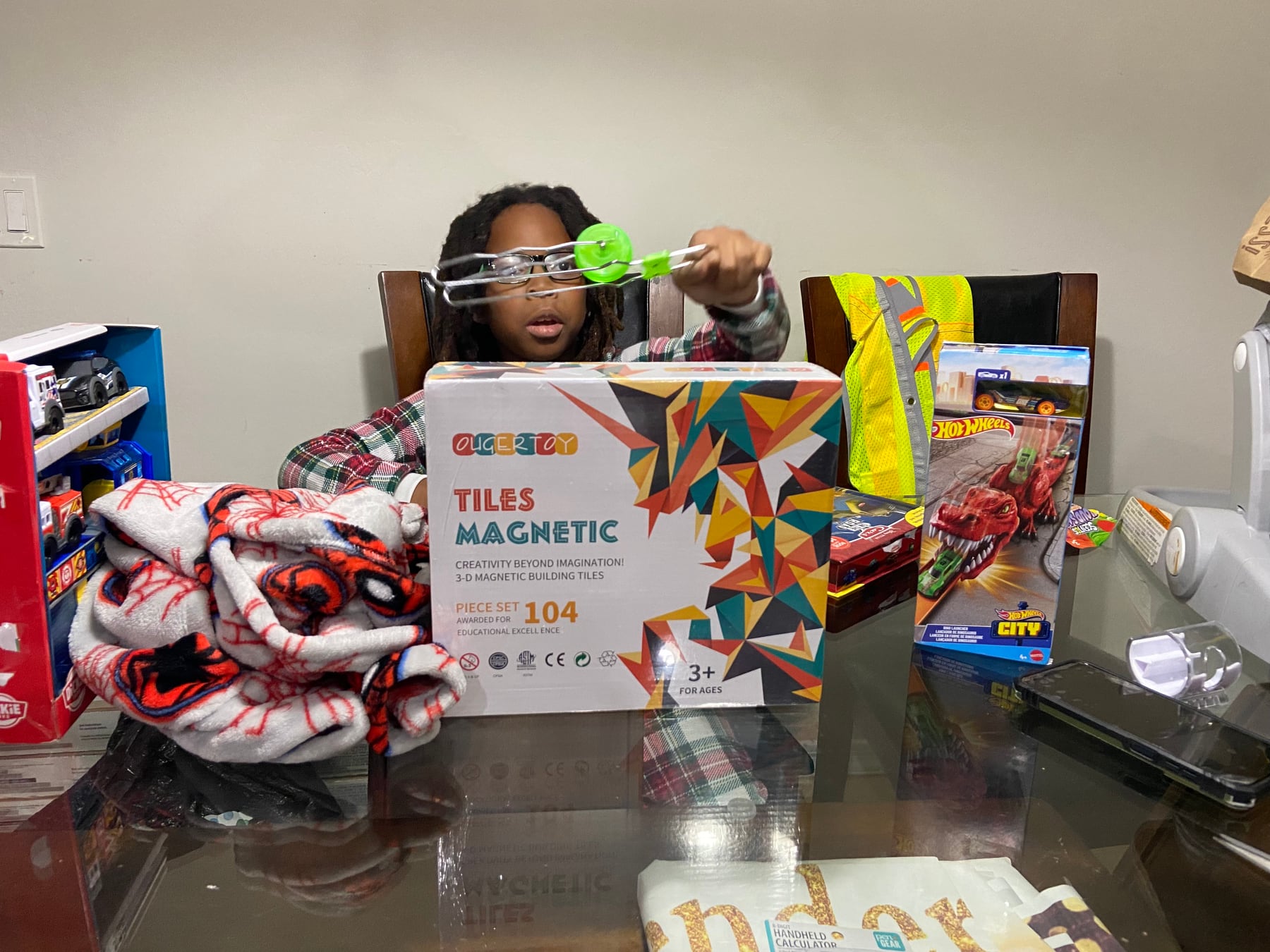A child with sensory and magnetic building gifts