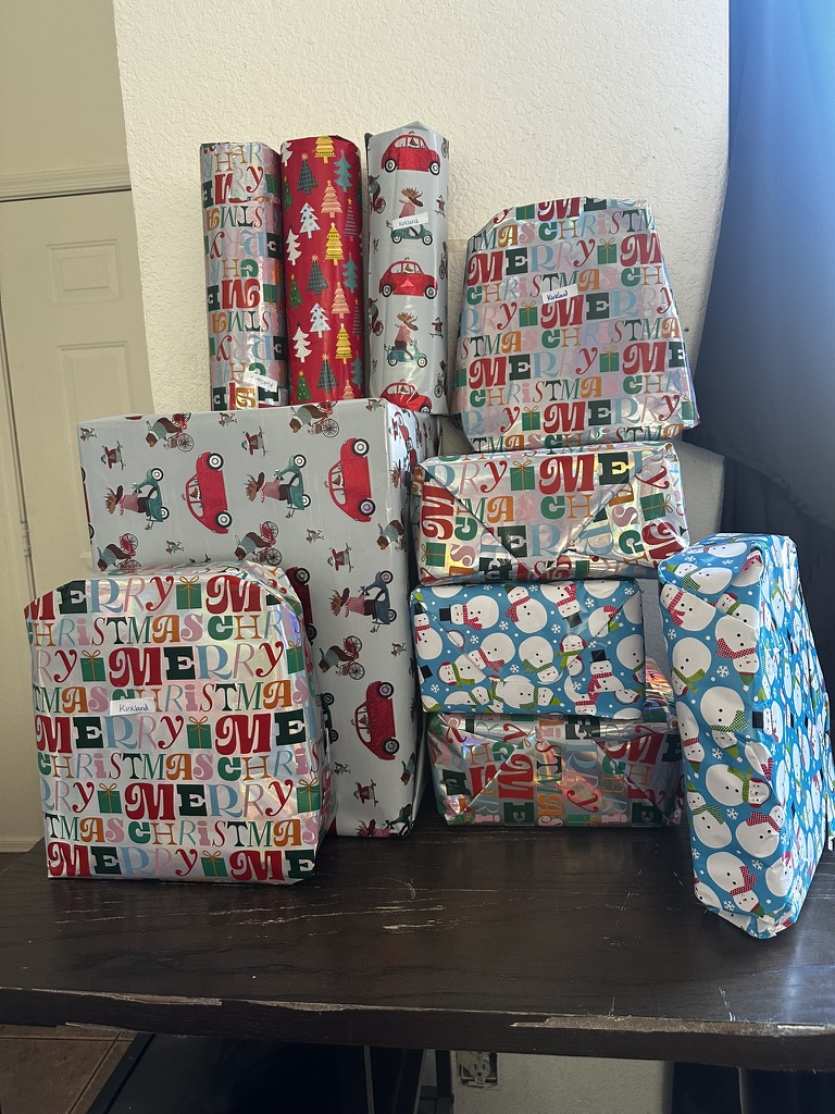 Colorfully wrapped Christmas presents organized for delivery