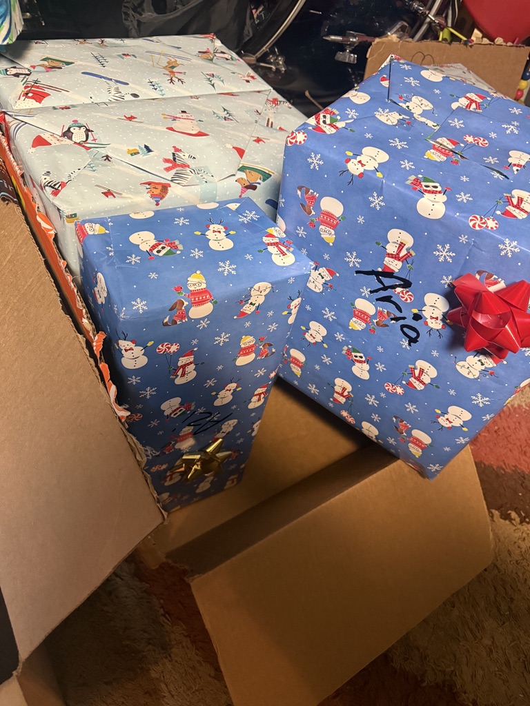 Large personalized Christmas gifts packed in a box