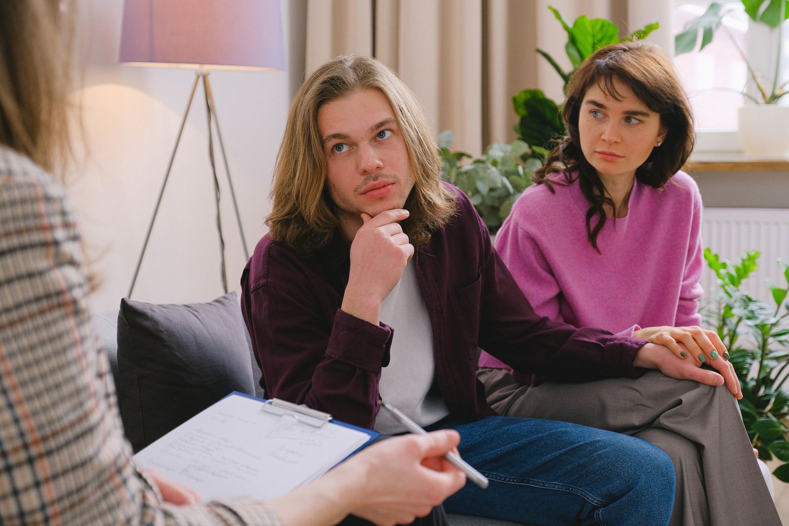 Representative image of a couple speaking with a counselor